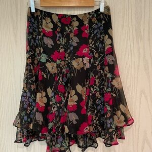 Floral Black Skirt. Size XS. Waist 14”.
